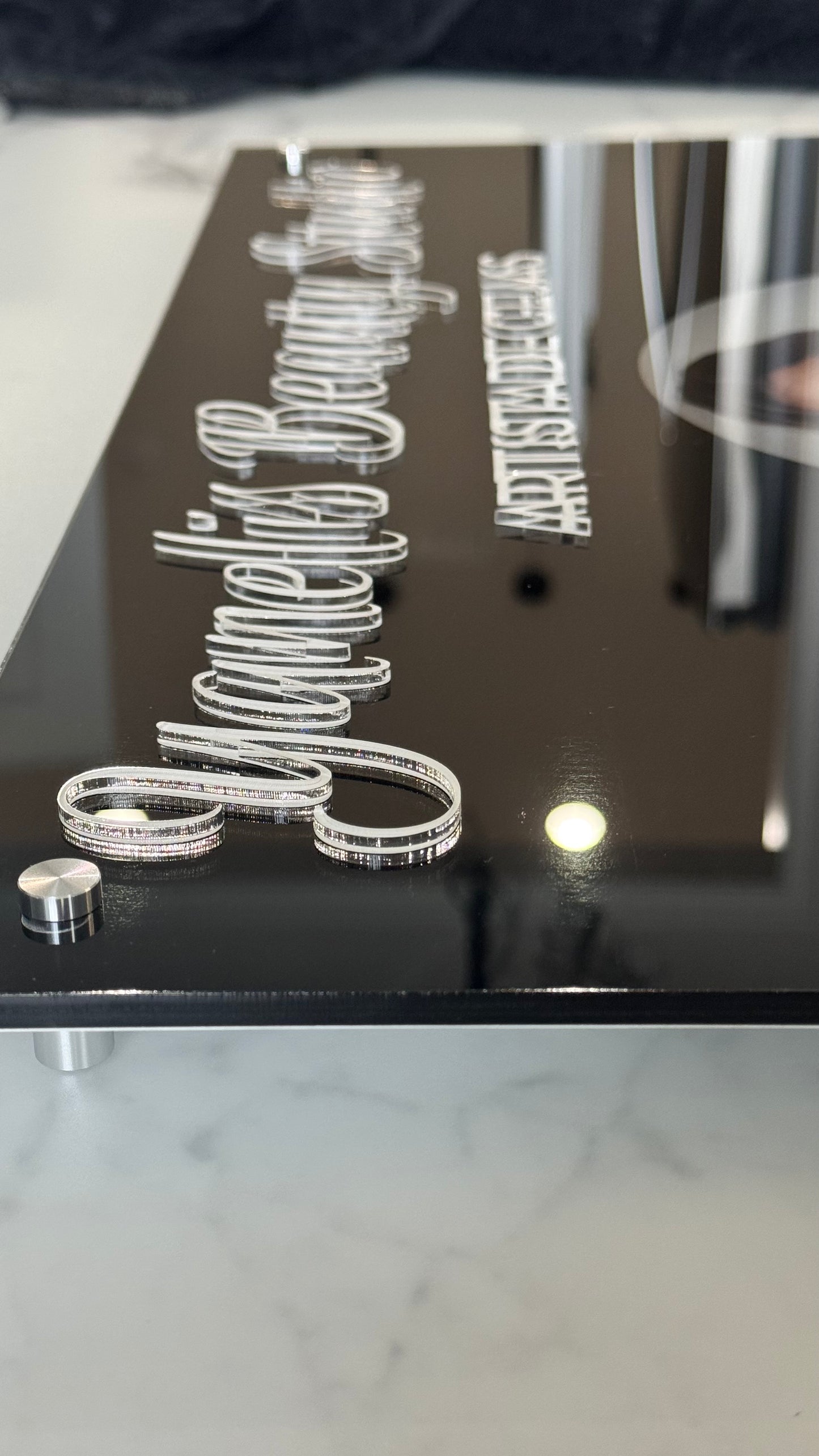 Black Acrylic Sign with Raised Letters and Custom Logo